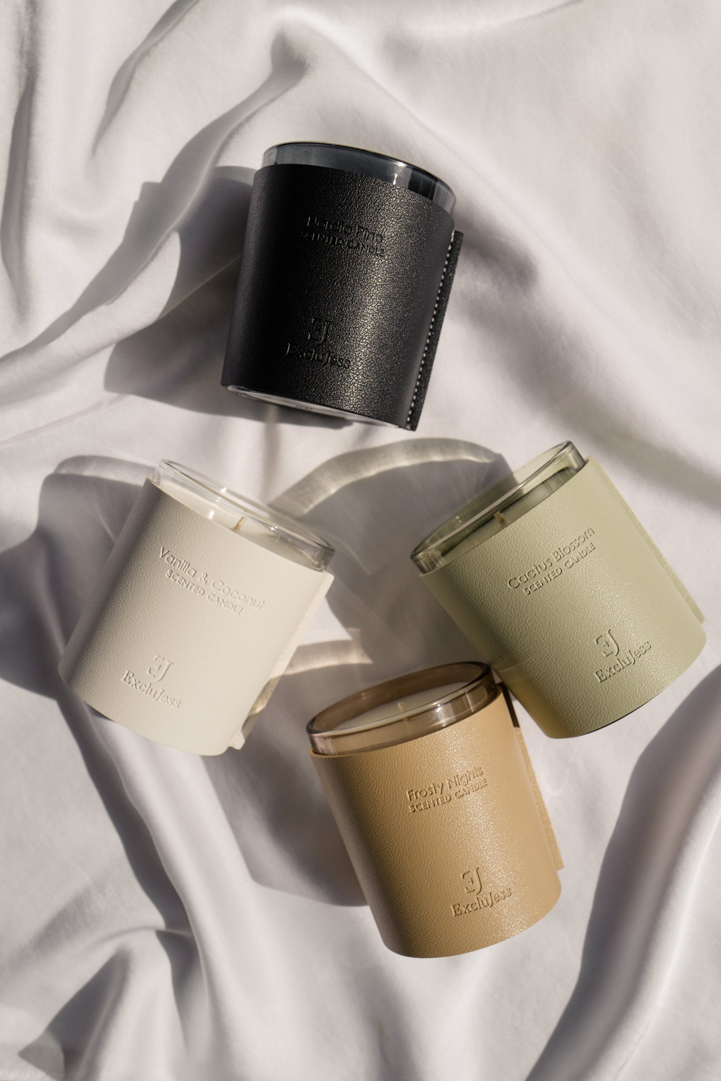 ExcluJess Leather Premium Candles Collection on white cloth
