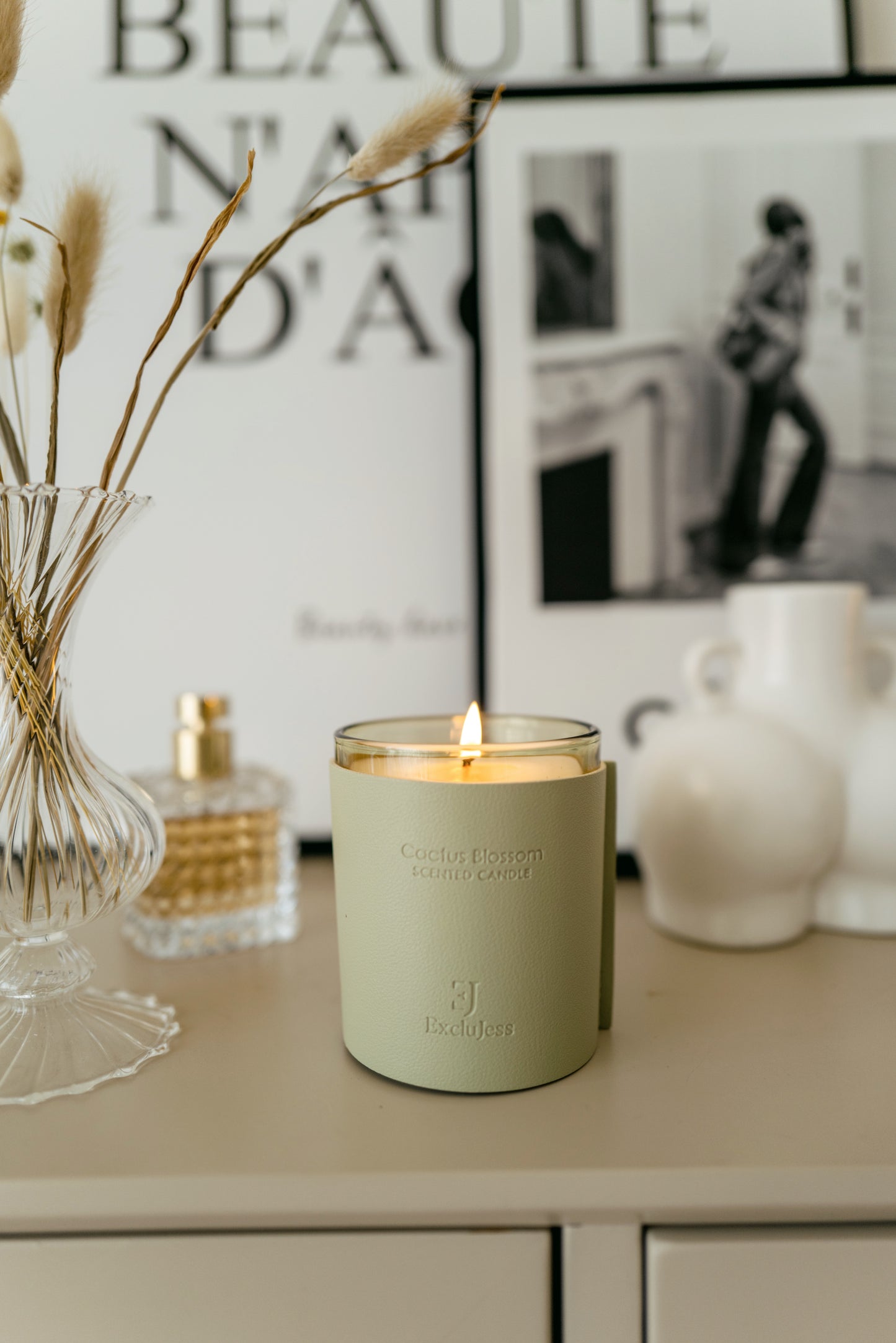 ExcluJess Leather Premium Candles Green on shelf lighted